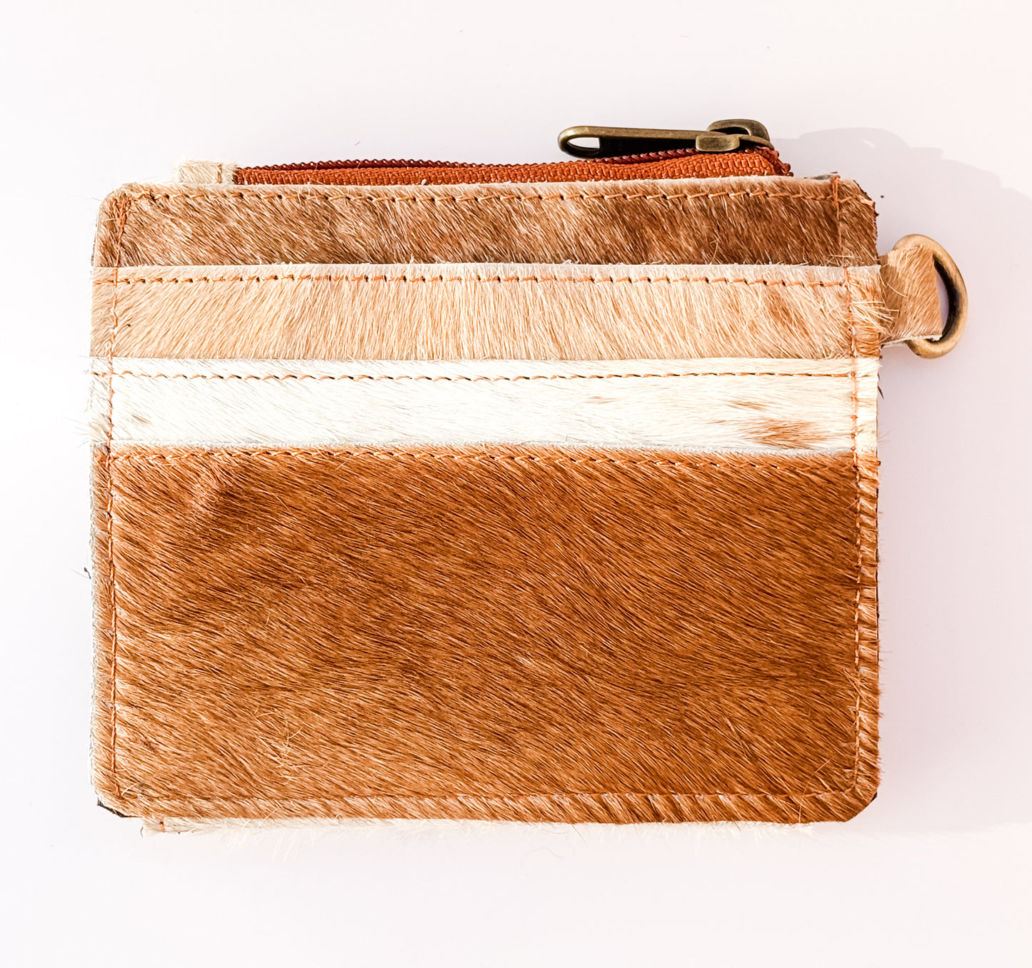 Saddle Drift Wallet- Genuine Hair on Hide leather- features detachable wrist strap, credit card slot, ID card slot and zipper