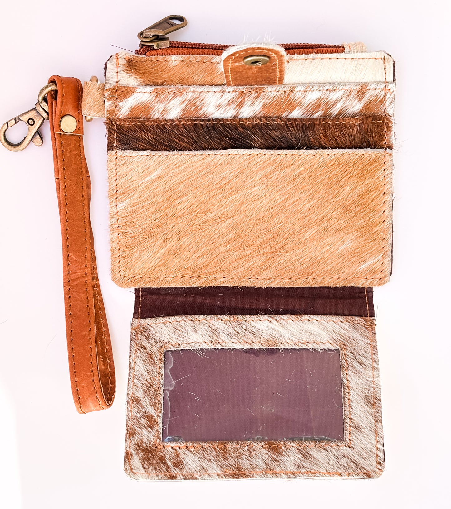 Saddle Drift Wallet- Genuine Hair on Hide leather- features detachable wrist strap, credit card slot, ID card slot and zipper