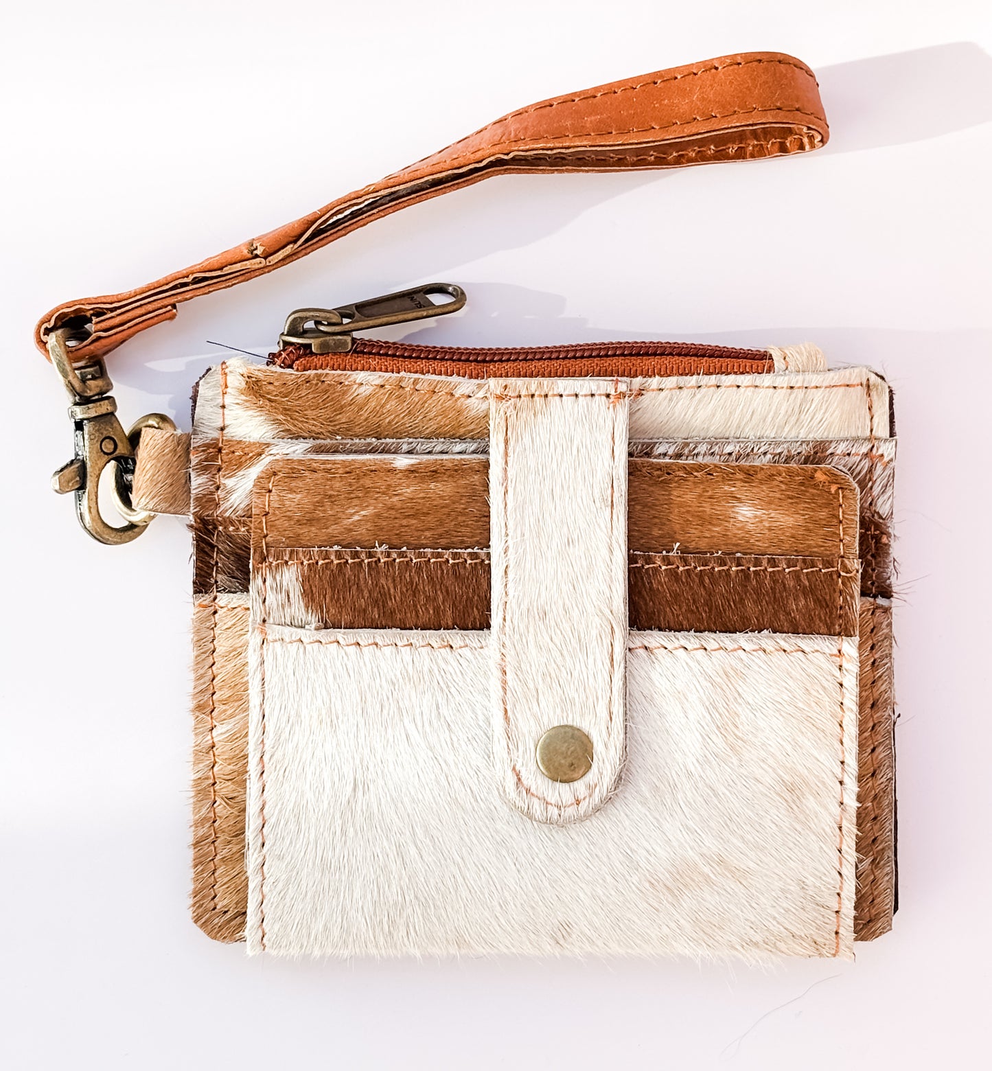 Saddle Drift Wallet- Genuine Hair on Hide leather- features detachable wrist strap, credit card slot, ID card slot and zipper