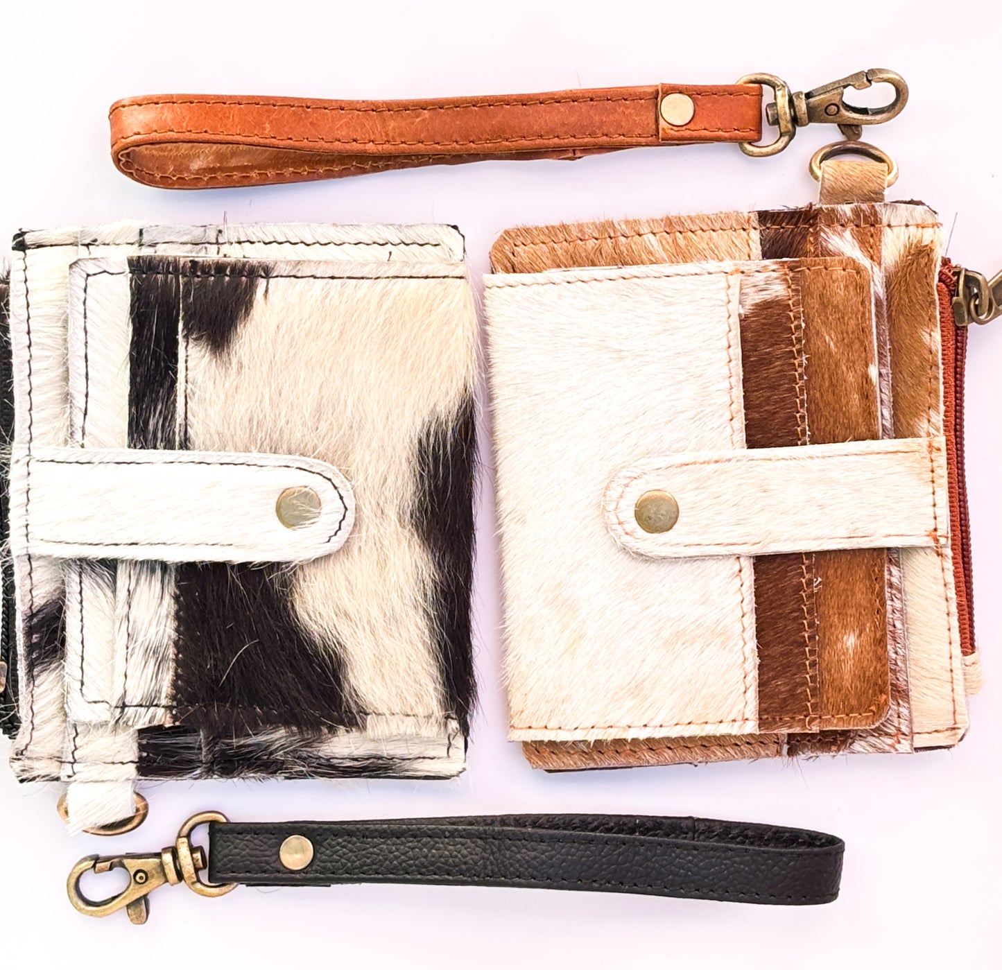 Saddle Drift Wallet- Genuine Hair on Hide leather- features detachable wrist strap, credit card slot, ID card slot and zipper