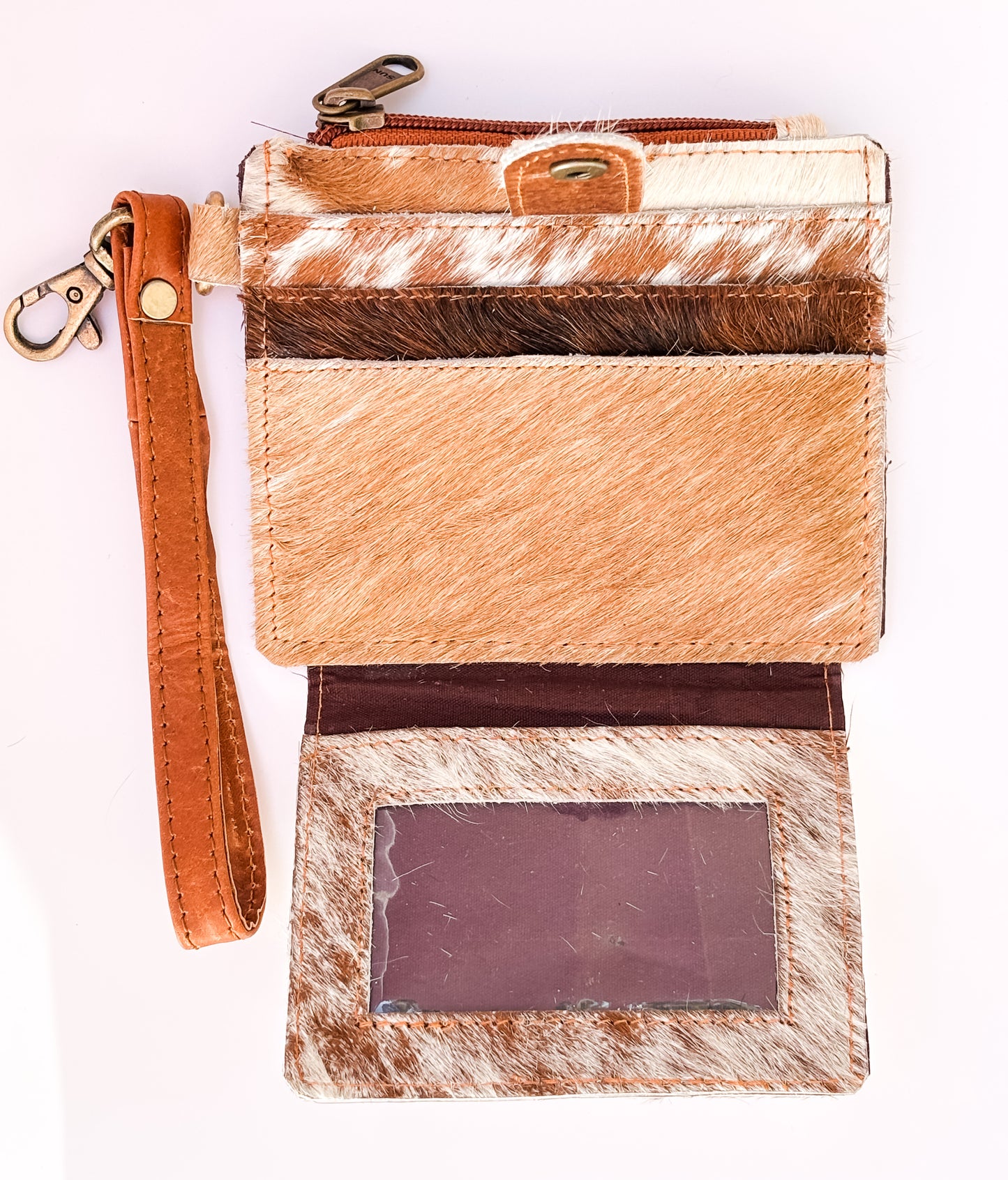 Saddle Drift Wallet- Genuine Hair on Hide leather- features detachable wrist strap, credit card slot, ID card slot and zipper